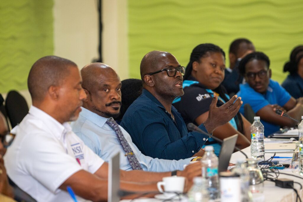 Attendees seated at a Mission Barbados conference or stakeholder meeting
